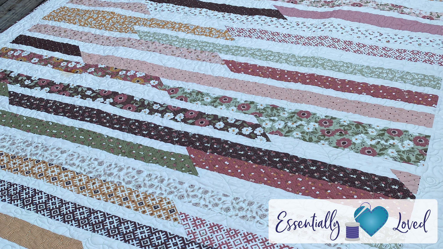 Essentially Loved fall romantic colored quilt in folktale by lella boutique for moda sweet roll race pattern