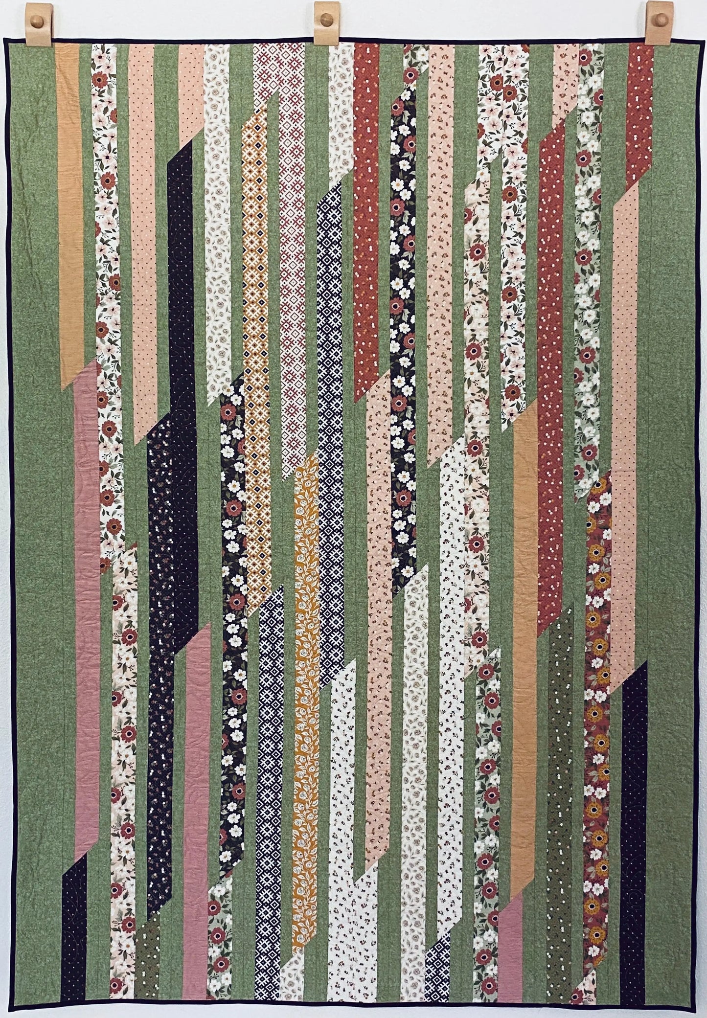 Sweet Roll Race Quilt Pattern - Paper - Essentially Loved Quilts