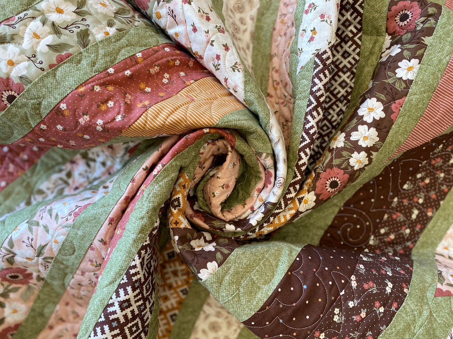 Strip Swirl Essentially Loved Quilts brown green gold rose cream fall