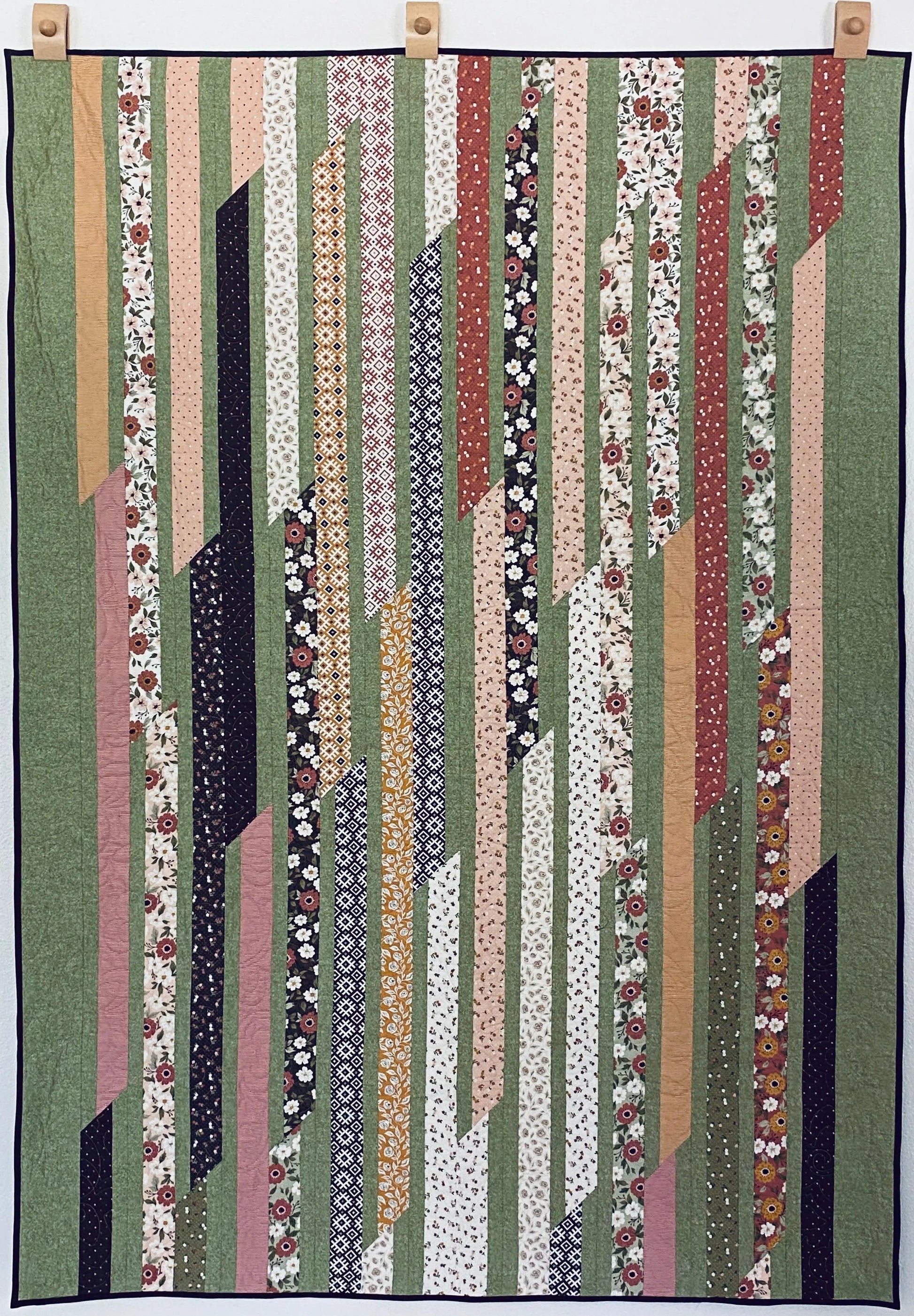 Sweet Roll Race Quilt Pattern - Paper - Essentially Loved Quilts